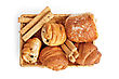 Buns With Raisins, Bread Sticks, Croissants, Puff Bun With Grit In A Wicker Basket