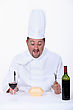 Stock Photo : Bearded Dragon Stock Photo: Chef Eating Fast-food And Drinking Wine