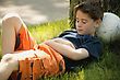 Child Sleeps On Soccer Ball - stock photo