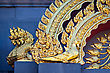 Stock Photo : Bearded Dragon Stock Photo: Decoration With Golden Dragons On The Wall