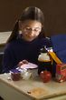 Stock Photo : Learning Stock Image: Girl Eating Lunch At Desk