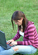 Stock Photo : Learning Stock Photo: Girl working on Laptop in Grass