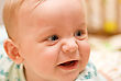 Stock Photo : Baby New Stock Photo: Happy Baby Boy Closeup Portrait Lying At The Bed