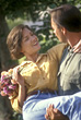 Happy Couple With Man Lifting Woman