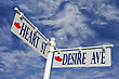 Stock Photo : Day Stock Photo: Heart Street And Desire Avenue Direction Post Over Blue Sky
