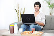 Stock Photo : Bearded Dragon Pictures: Man Doing Computer At Breakfast