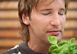 Stock Photo : Herb Stock Photo: Man Smelling Herbs With Eyes Closed
