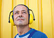 Stock Photo : Mature Stock Image: Man Wearing Hearing Protection