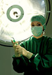 Nurse With Surgical Mask Holding Syringe