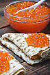 Pancakes With Red Caviar On The Table