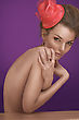 Stock Photo : Perfect Stock Photography: Portrait Of A Shy Sexy Nude Woman Wearing A Scarlet Hat