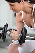 Stock Photo : Fitness &amp; Exercise Stock Photography: Pretty Brunette Lifting Barbell