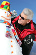 Stock Photo : Positive Stock Photography: Senior Man With A Snowman
